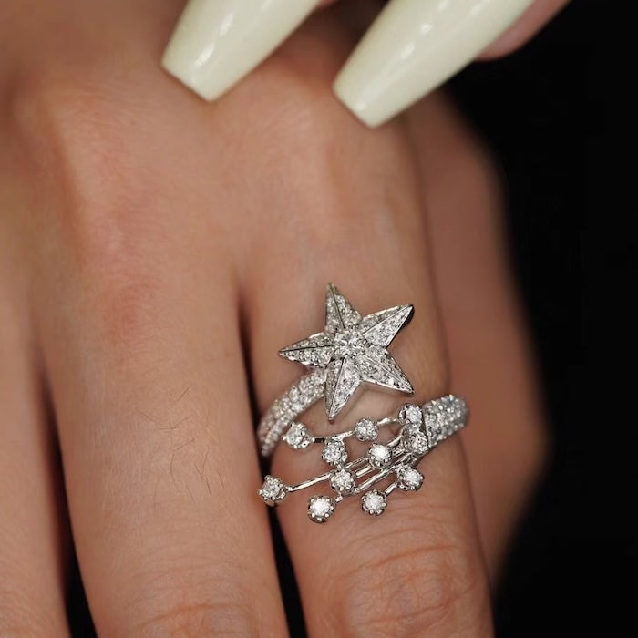 Radiant Starfall jewelry set featuring sparkling celestial star stud earrings and a matching adjustable ring crafted in white gold plated brass with premium grade zirconia.
