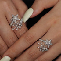 Radiant Starfall jewelry set featuring sparkling celestial star stud earrings and a matching adjustable ring crafted in white gold plated brass with premium grade zirconia.
