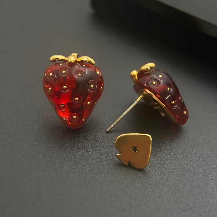 Sweet Strawberry Jewelry Set featuring glossy red strawberry stud earrings and a matching pendant necklace crafted in gold-plated brass with hand-finished resin enamel.
