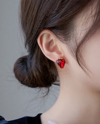 Sweet Strawberry Jewelry Set featuring glossy red strawberry stud earrings and a matching pendant necklace crafted in gold-plated brass with hand-finished resin enamel.
