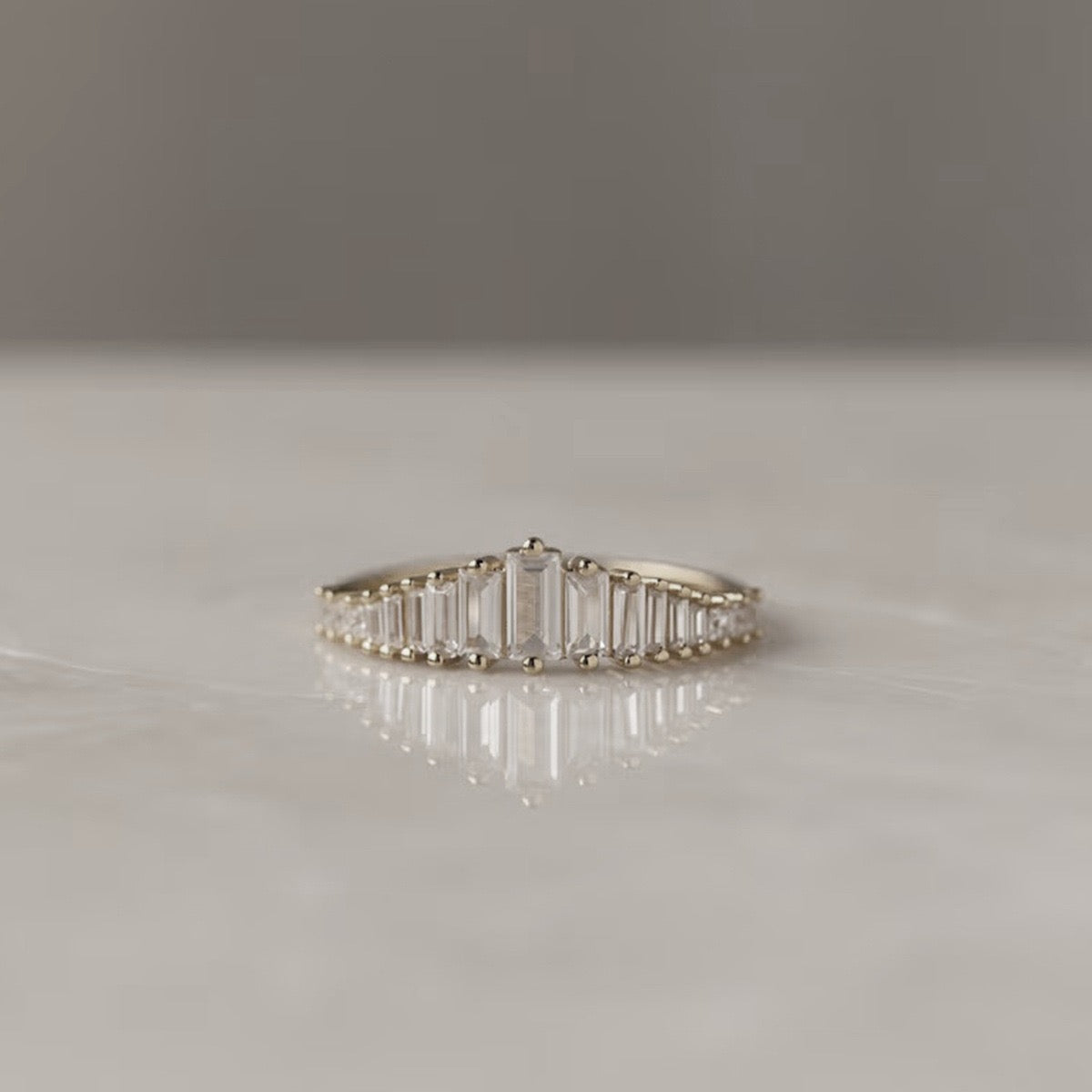 Transition Eternity Rings with Emerald-cut Stones