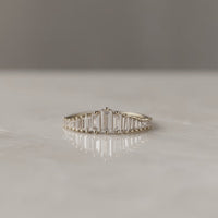 Transition Eternity Rings with Emerald-cut Stones