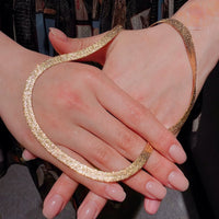 Ultra Shiny Layered Herringbone Chain Necklace featuring layered 7 mm herringbone chains with a highly polished finish in gold and silver-tone options.
